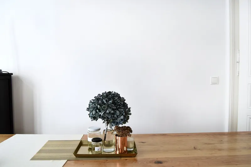 Handcrafted solid-wood serving trays with brass handles, made in India