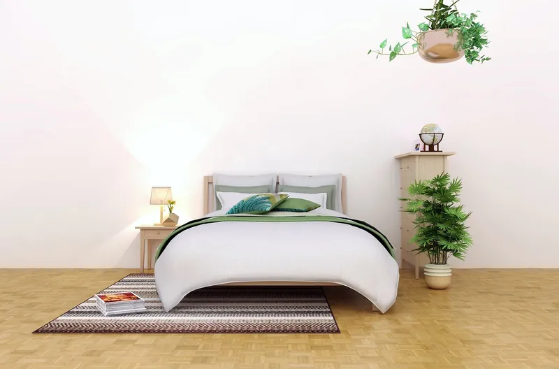 Cane bed with hand-woven rattan headboard panel in a solid-wood frame, handcrafted in India