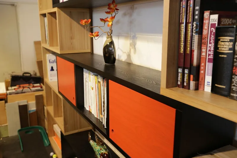 Solid mango wood bookshelf with warm golden-brown grain, handcrafted in Jodhpur, India