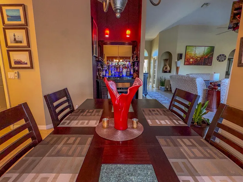 Solid sheesham colonial dining table with turned legs and planked top, handcrafted in Jodhpur, India