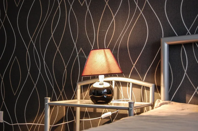 Epoxy resin river headboard with a live-edge sheesham wood frame and tinted blue resin inlay
